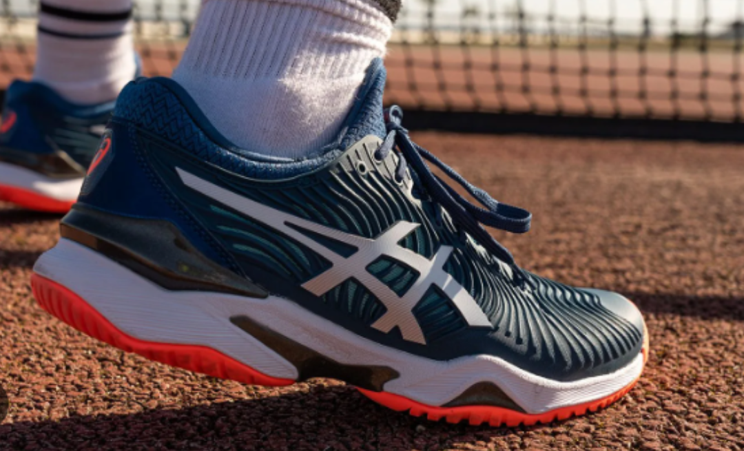 Asics shoes on tennis court