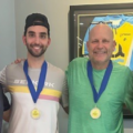 Pickleball players standing together with their medals from a Club championship event.